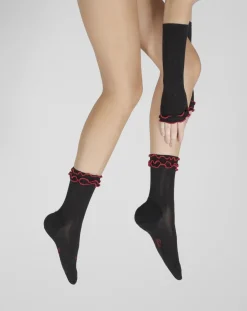 Outlet Berthe Aux Grands Pieds Chaussettes en soie noire à surjets rouges